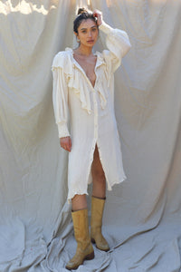 model wears dress unbelted