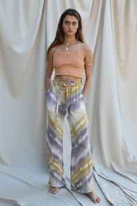 high rise paper bag waist purple, green, and natural tie dye pant